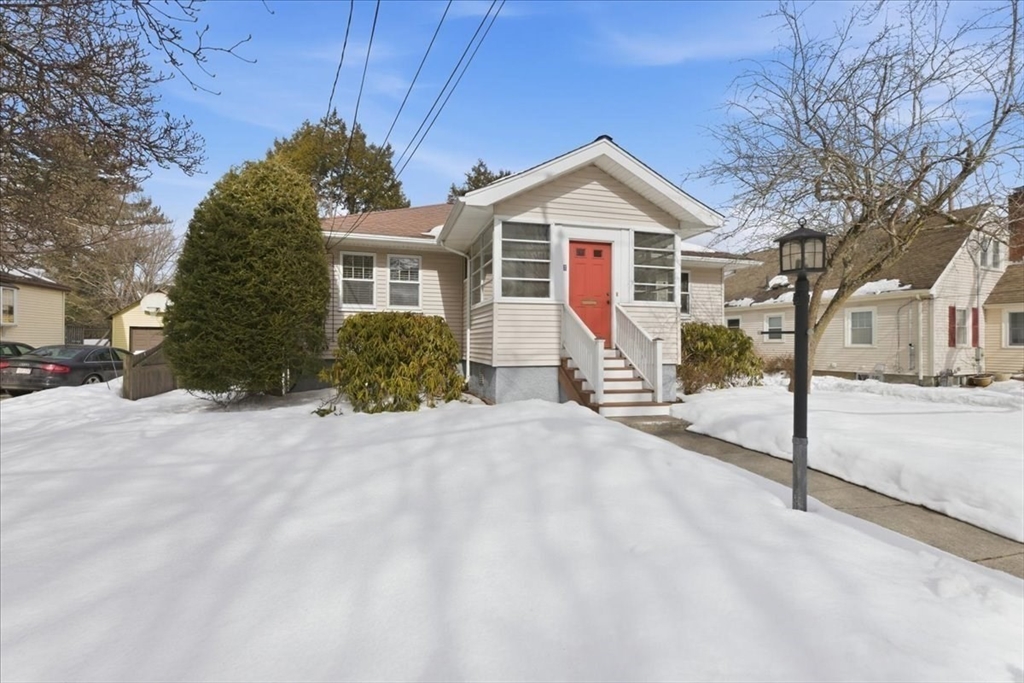 7 West Street Needham, MA 02494 - Photo 2 of 36 a front view of a house with a yard