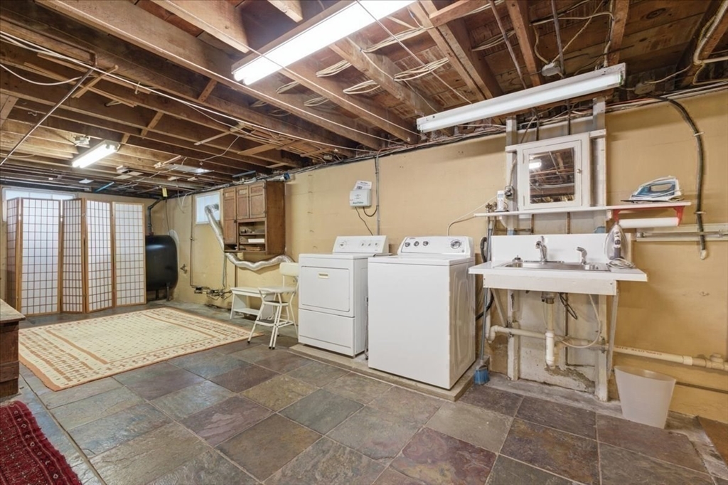 7 West Street Needham, MA 02494 - Photo 29 of 36 a utility room with dryer and washer