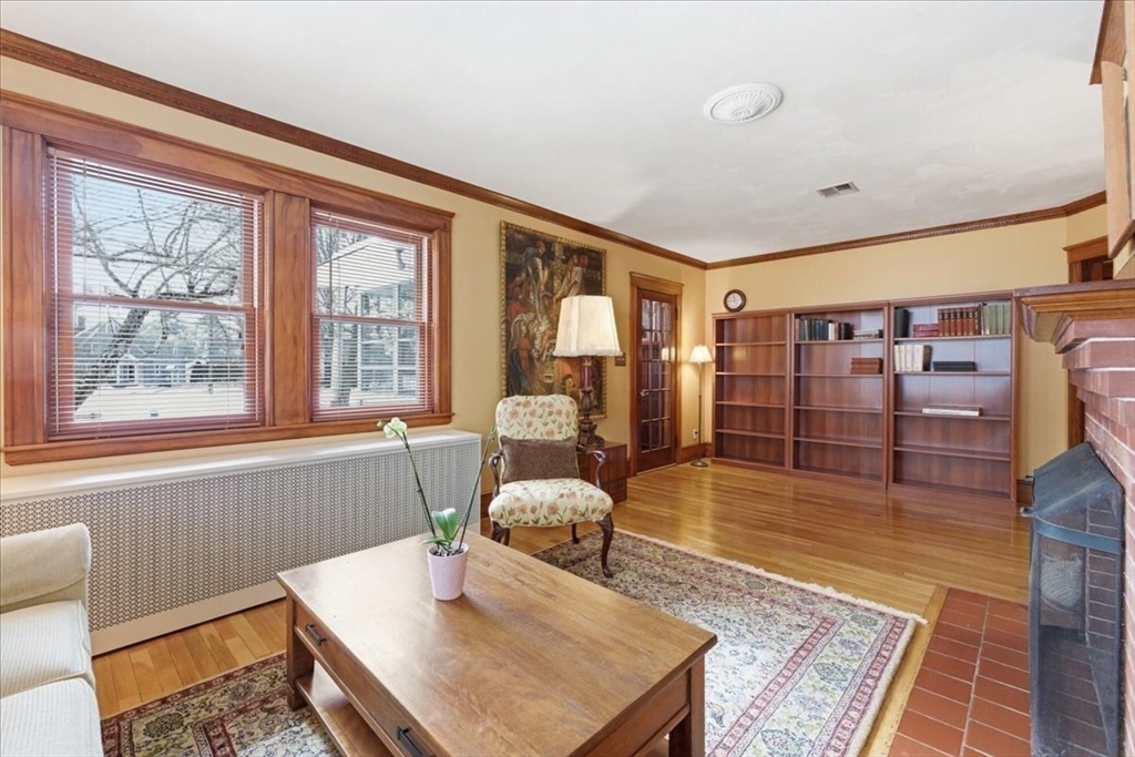 7 West Street Needham, MA 02494 - Photo 8 of 36 a living room with furniture and a large window
