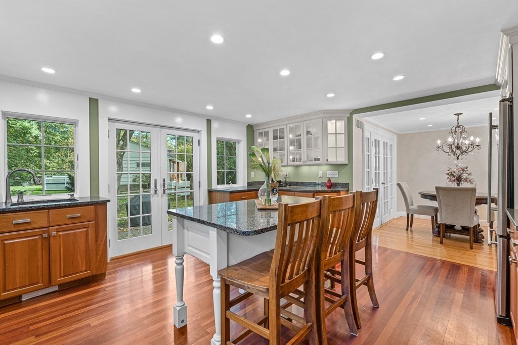98 Parker Road Wellesley, MA 02482 - Photo 11 of 30 a view of a dining room with furniture window and wooden floor