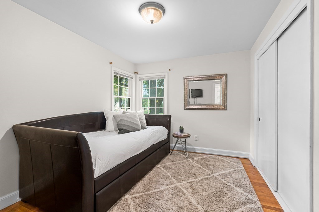 98 Parker Road Wellesley, MA 02482 - Photo 15 of 30 a bedroom with bed and window