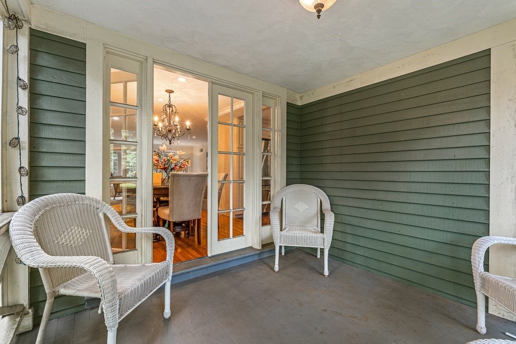 98 Parker Road Wellesley, MA 02482 - Photo 17 of 30 a room with a chair and a window