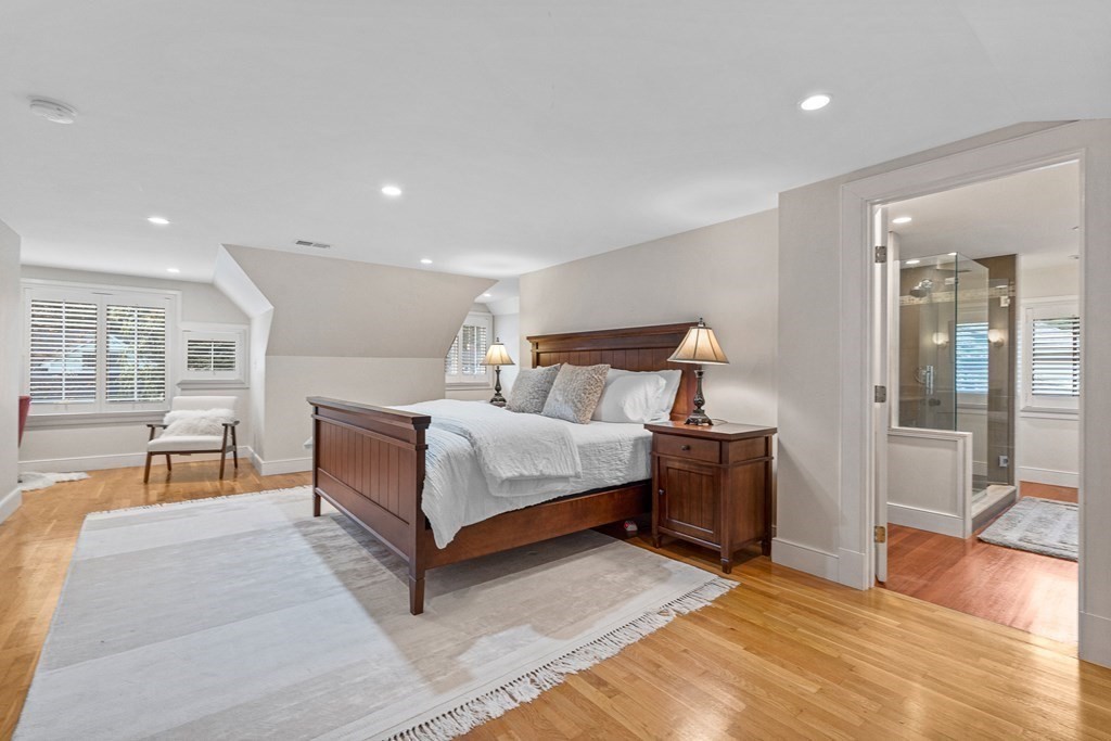 98 Parker Road Wellesley, MA 02482 - Photo 18 of 30 a bedroom with a bed and glass door