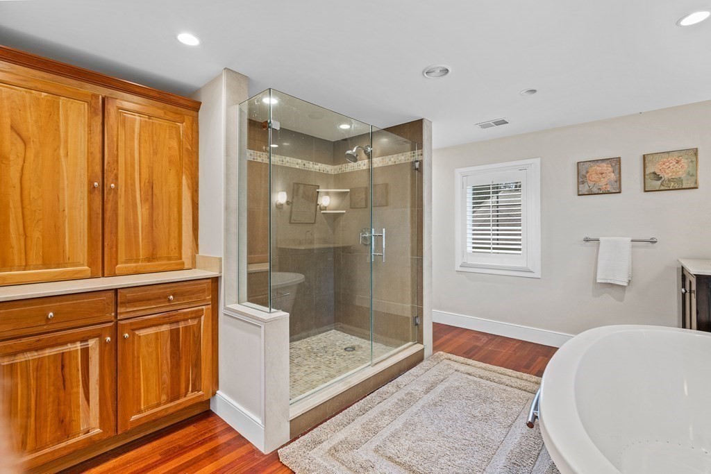 98 Parker Road Wellesley, MA 02482 - Photo 22 of 30 a bathroom with a bathtub and a shower