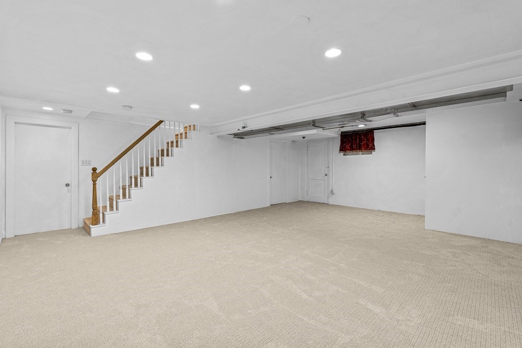 98 Parker Road Wellesley, MA 02482 - Photo 30 of 30 a view of an empty room with a projector space