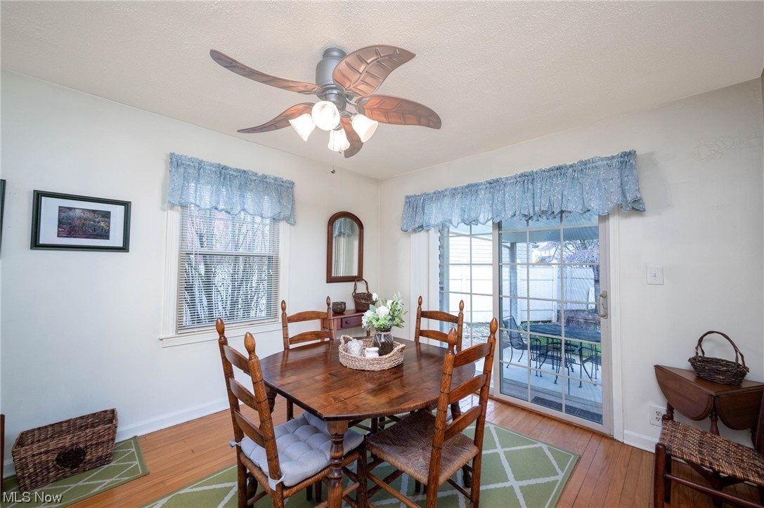 253 Butler Road Northeast Warren, OH 44483 - Photo 11 of 35 Dining area featuring light hardwood / wood-style floors and ceiling fan