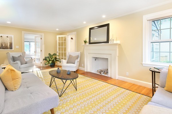 29 Parker Road Needham, MA 02494 - Photo 2 of 14 a living room with furniture and a fireplace