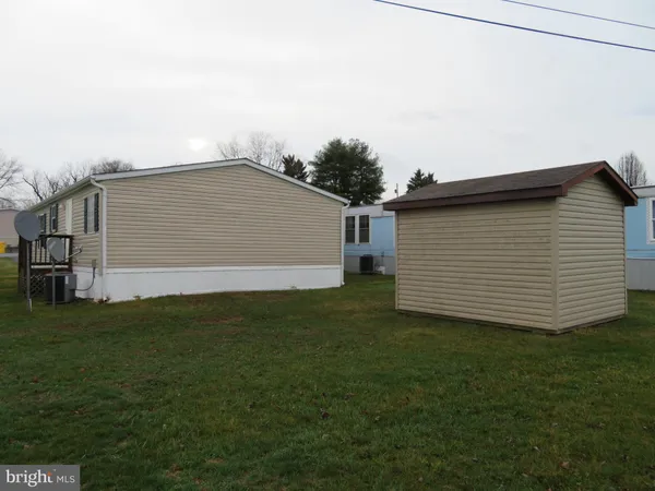 a view of a balcony with wooden floor and wooden floor