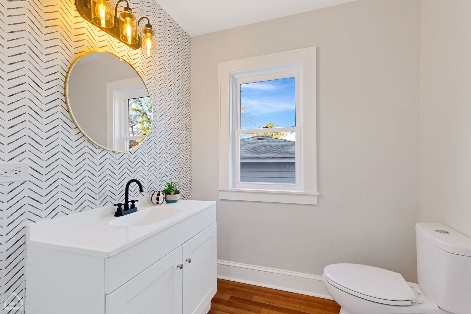 30 North Delaplaine Road Riverside, IL 60546 - Photo 9 of 21 a bathroom with a sink mirror and vanity