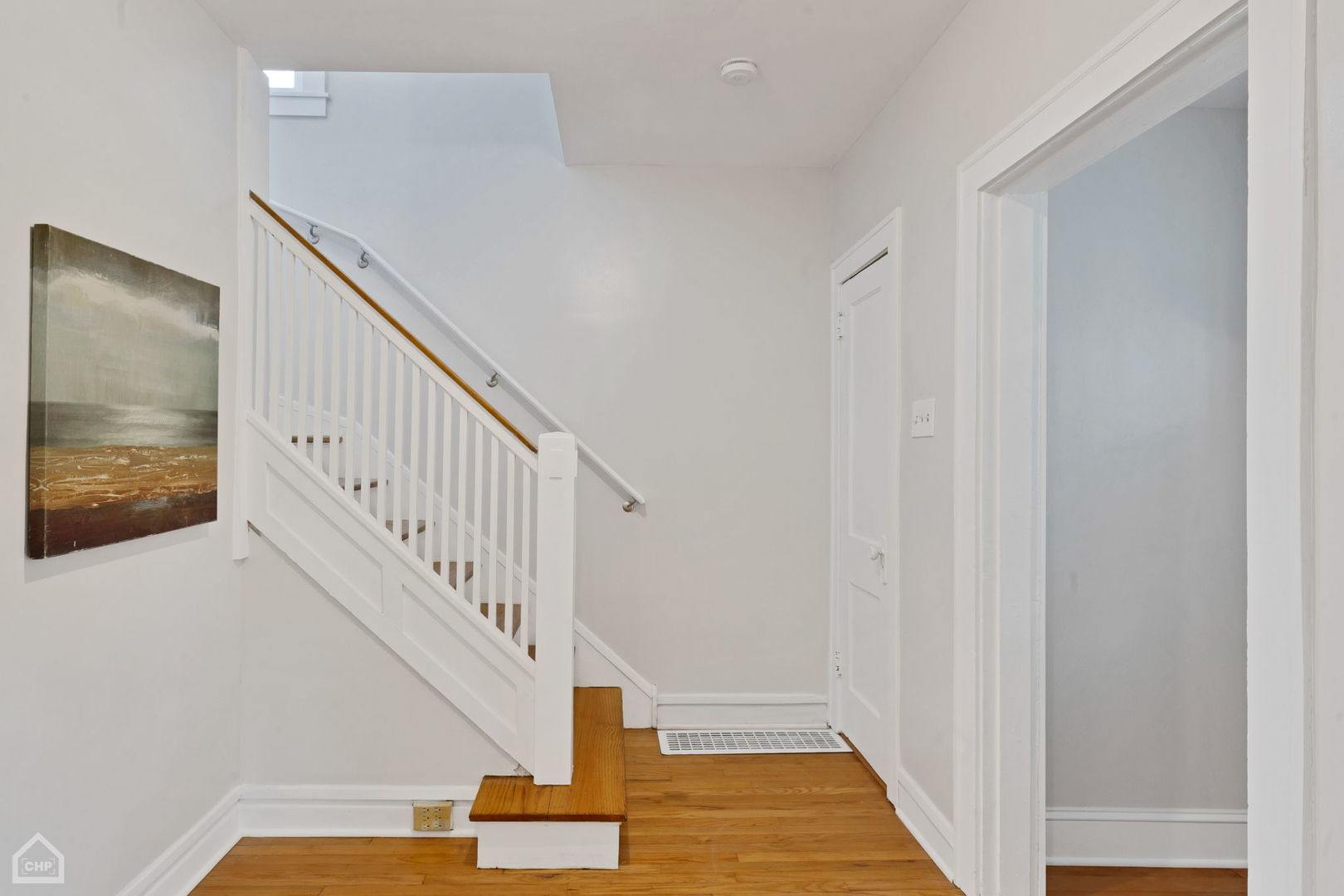30 North Delaplaine Road Riverside, IL 60546 - Photo 10 of 21 a view of entryway with wooden floor