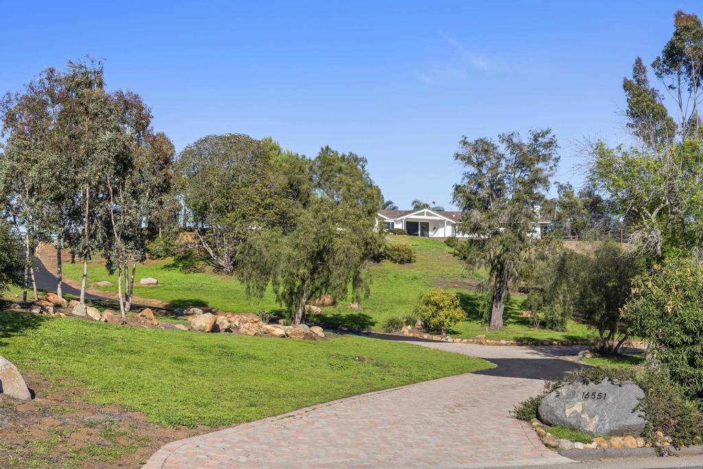 16551 Zumaque Street Rancho Santa Fe, CA 92067 - Photo 11 of 11 a view of a park with large trees
