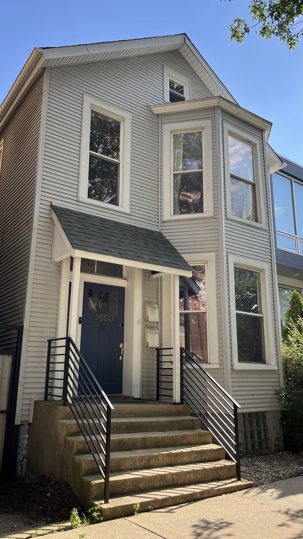 a view of a house with a balcony
