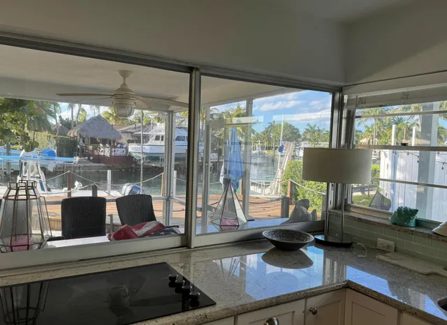 a room with furniture and a large window