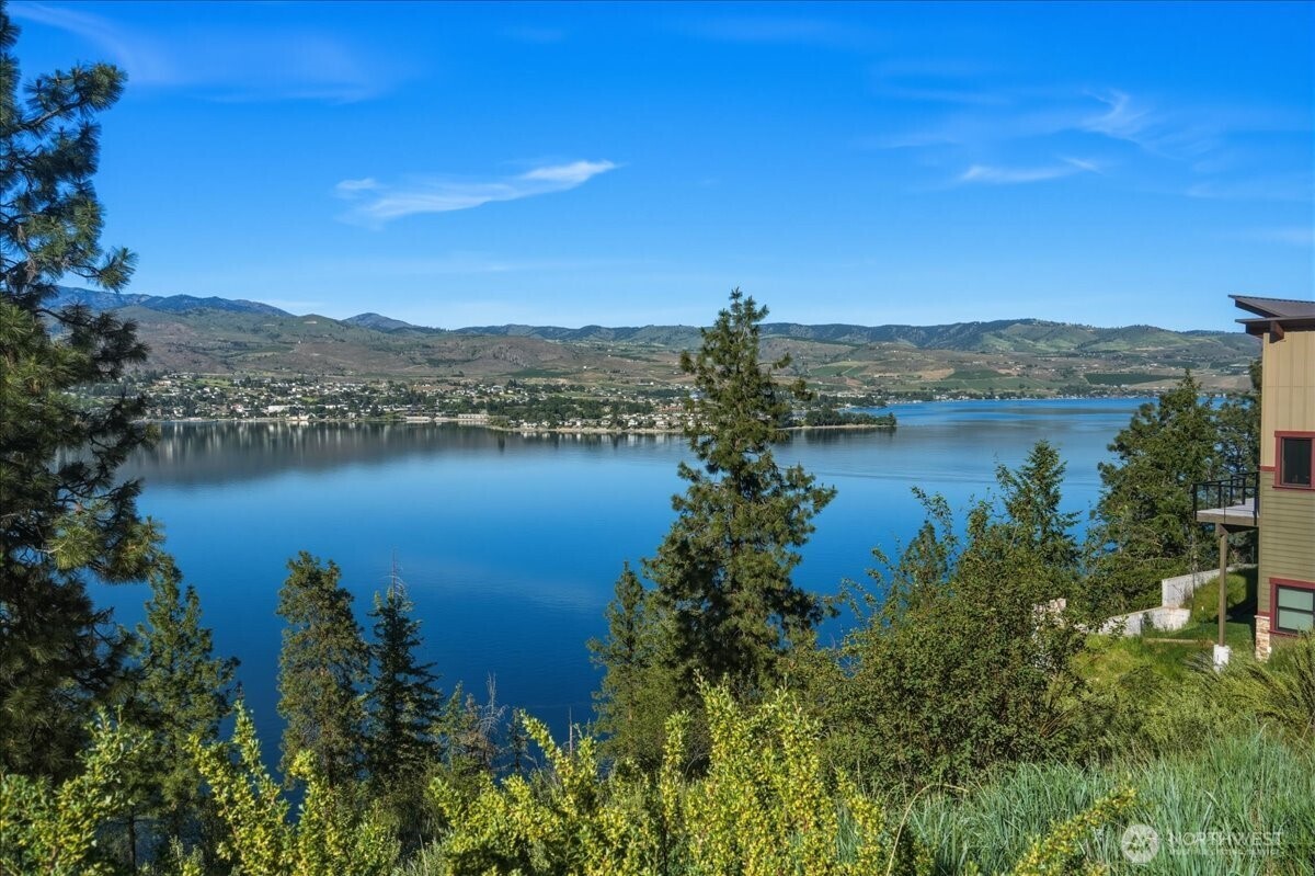 7376 Ridgeview Drive Chelan, WA 98816 - Photo 4 of 21 a view of a lake with a city