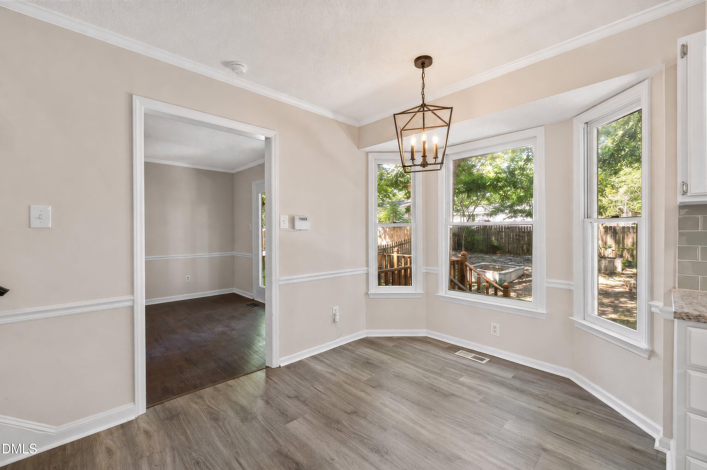 4713 Draper Road Raleigh, NC 27616 - Photo 9 of 39 Eat-in Area with New Fixture
