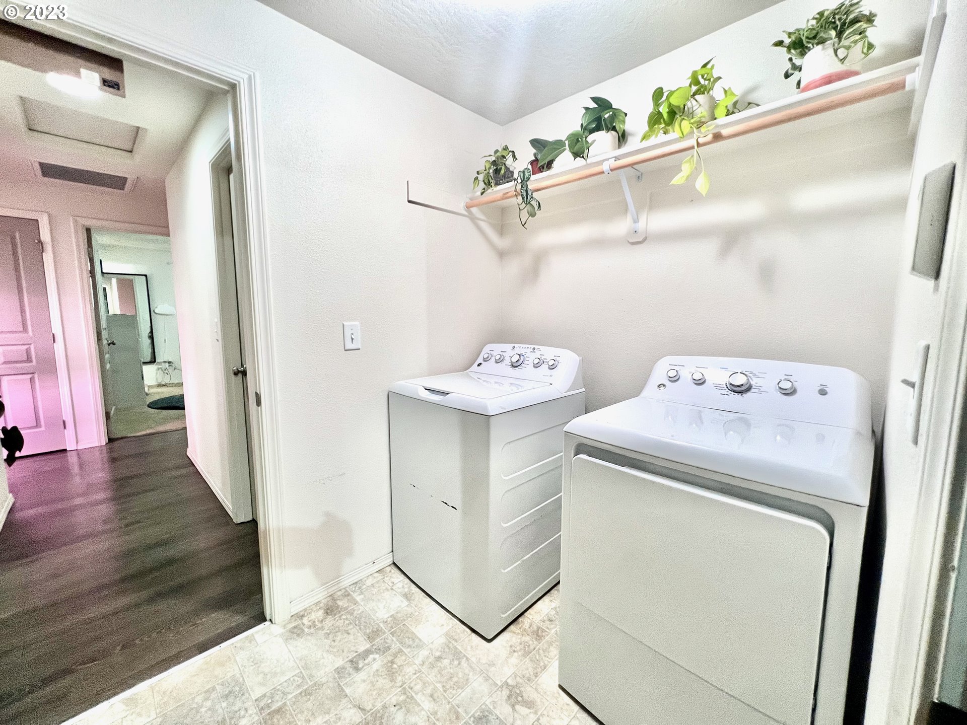 4686 Rocky Road Springfield, OR 97478 - Photo 17 of 25 a storage room with wooden floor washer and dryer