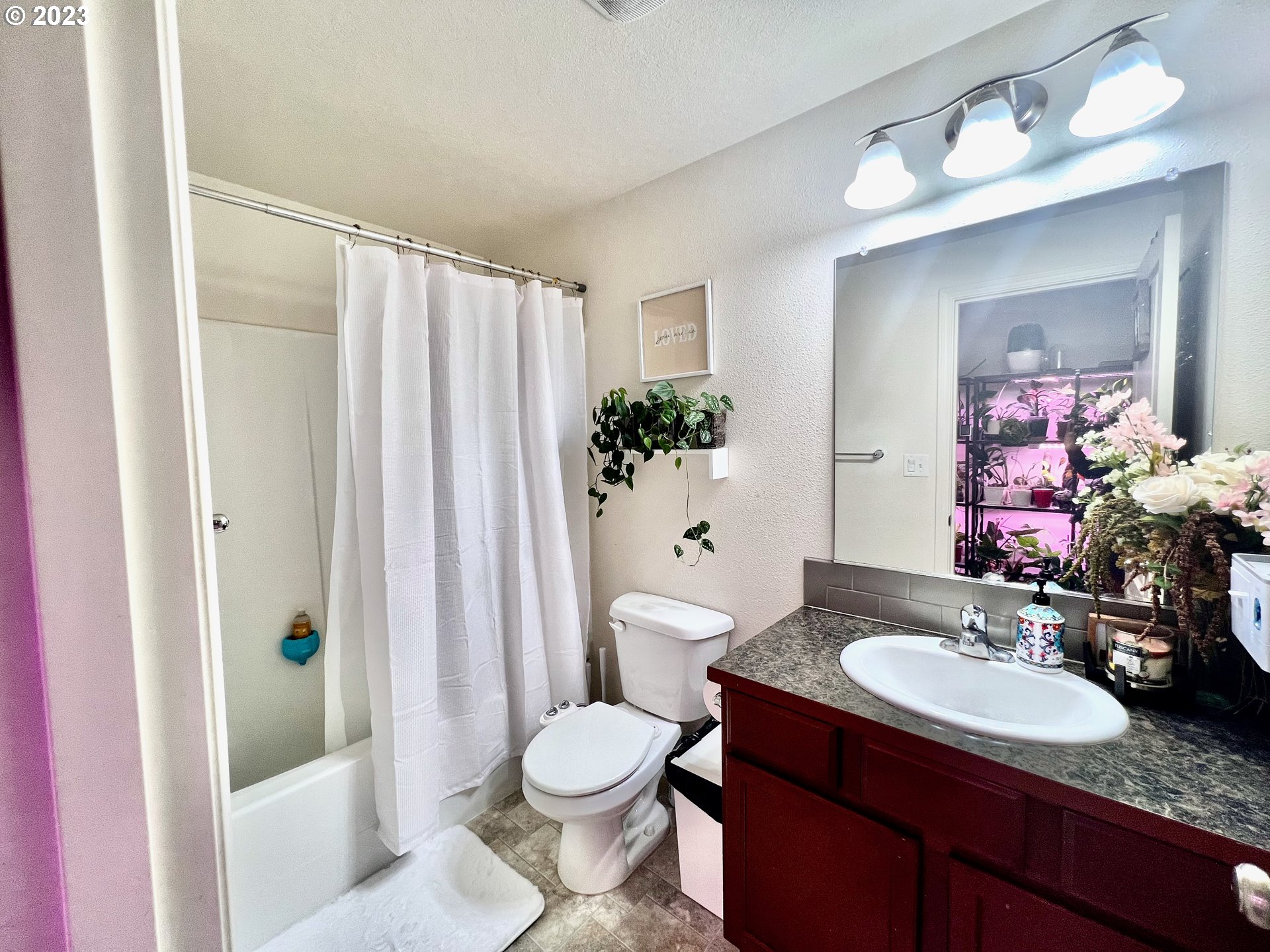 4686 Rocky Road Springfield, OR 97478 - Photo 10 of 25 a bathroom with a granite countertop sink toilet and shower