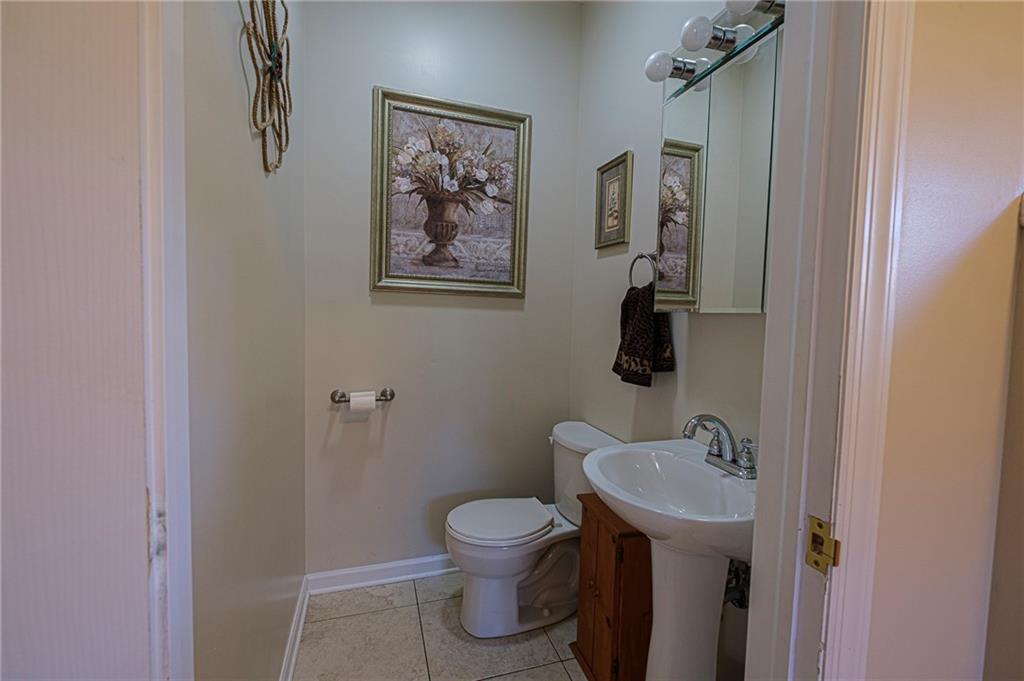 627 Harmony Road Baden, PA 15005 - Photo 11 of 25 Power Room located on main level