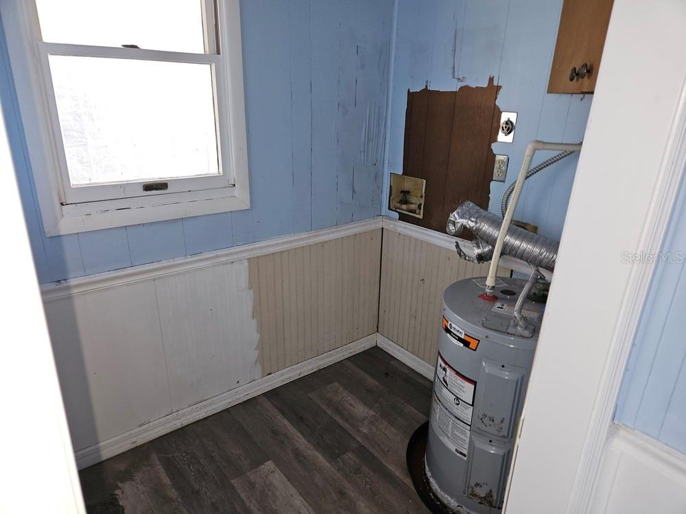 5281 Tuna Lane Weeki Wachee, FL 34607 - Photo 12 of 16 a room with storage and utility