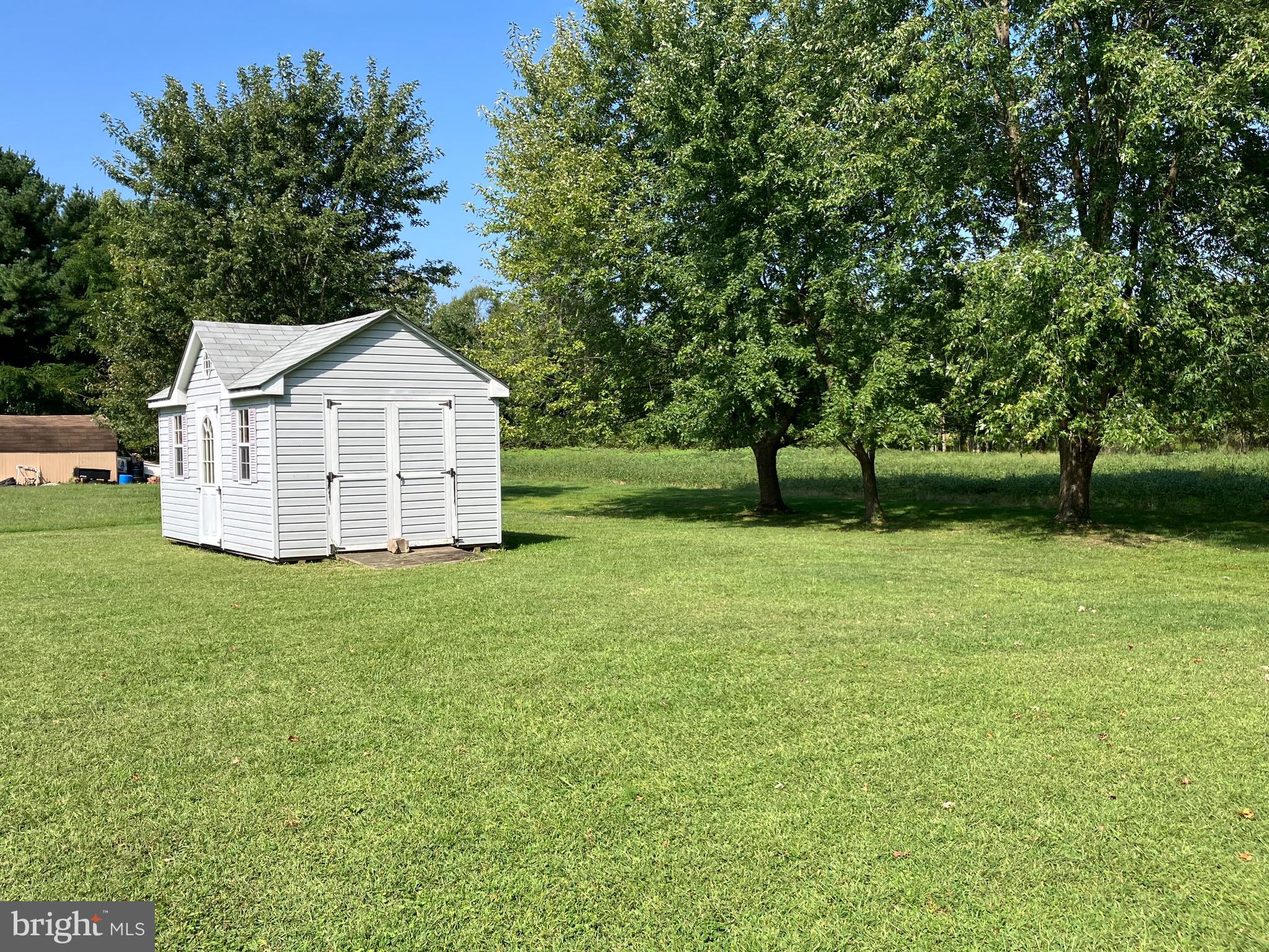 21336 Haven Road Rock Hall, MD 21661 - Photo 26 of 29 a view of a house with a yard