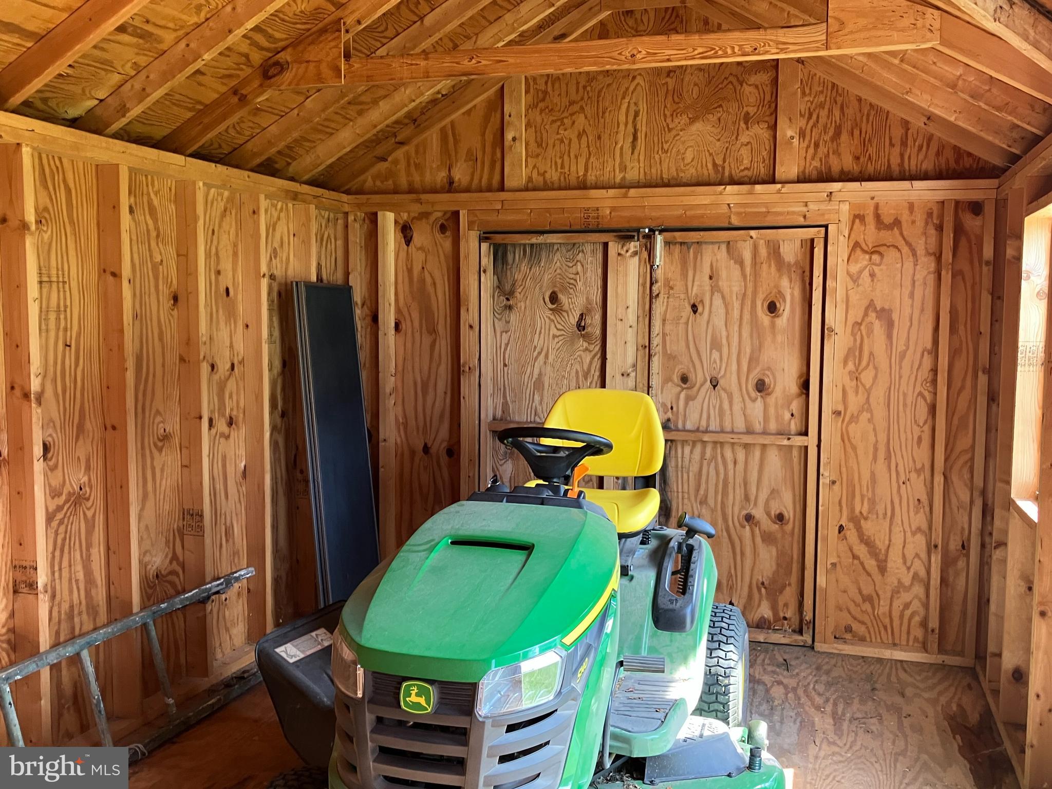 21336 Haven Road Rock Hall, MD 21661 - Photo 27 of 29 Inside shed - Tractor not included
