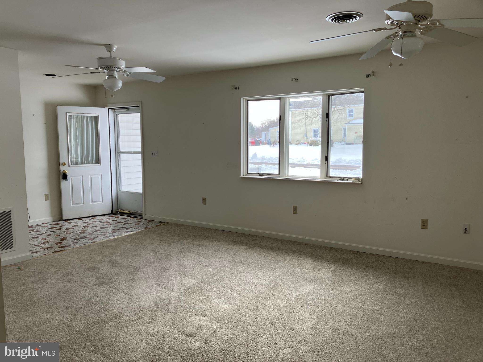 21336 Haven Road Rock Hall, MD 21661 - Photo 5 of 29 a view of an empty room with a window