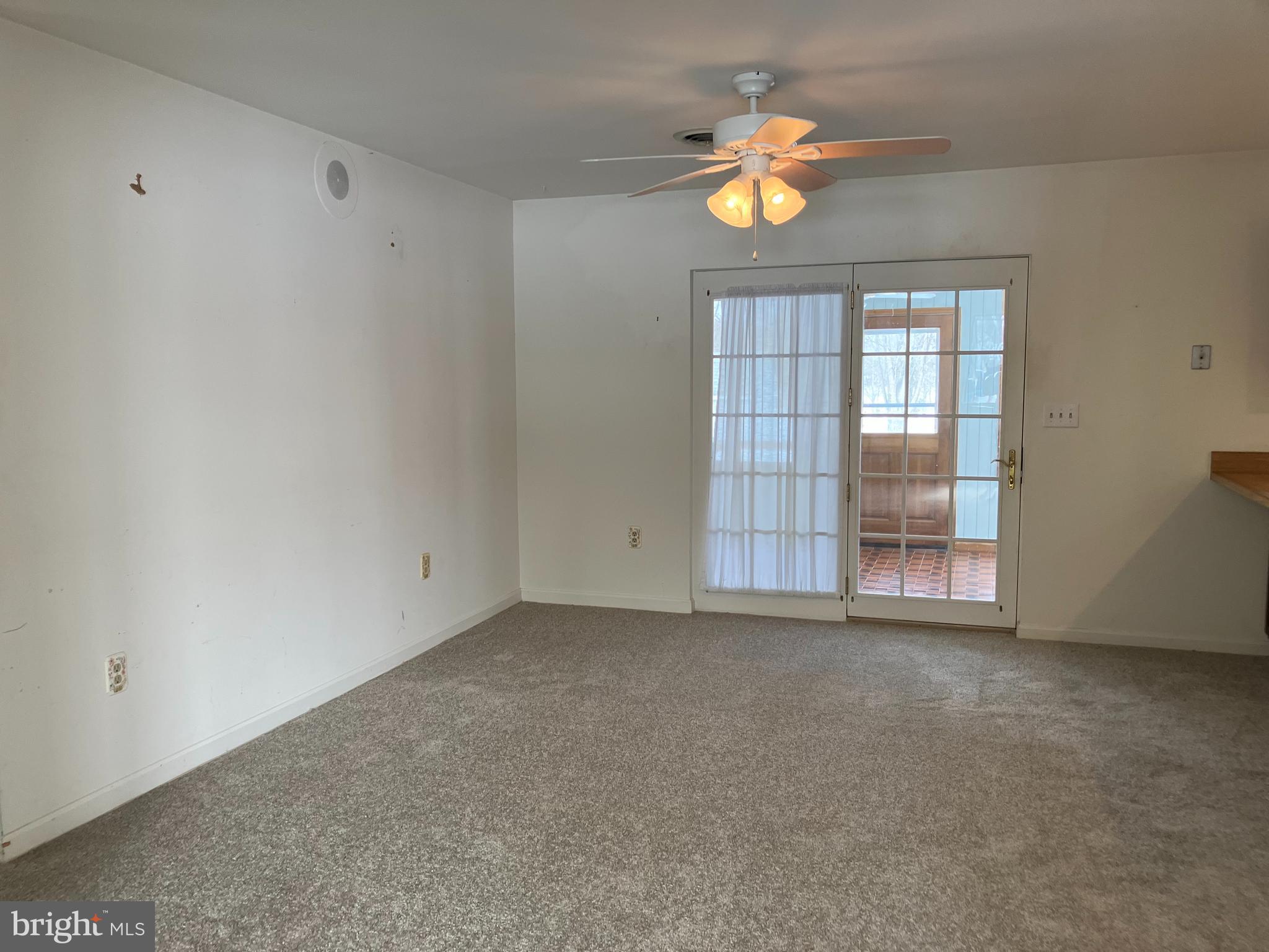 21336 Haven Road Rock Hall, MD 21661 - Photo 9 of 29 a view of an empty room with a window