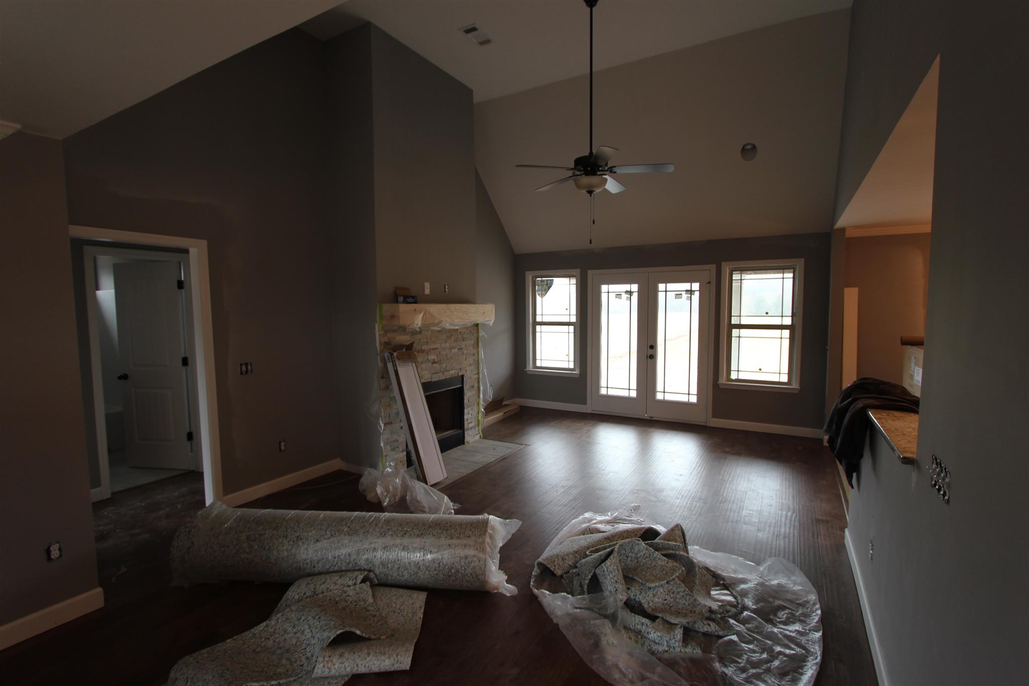 400 Beech Log Road Watertown, TN 37184 - Photo 11 of 22 a view of a livingroom with furniture hardwood floor and a ceiling fan