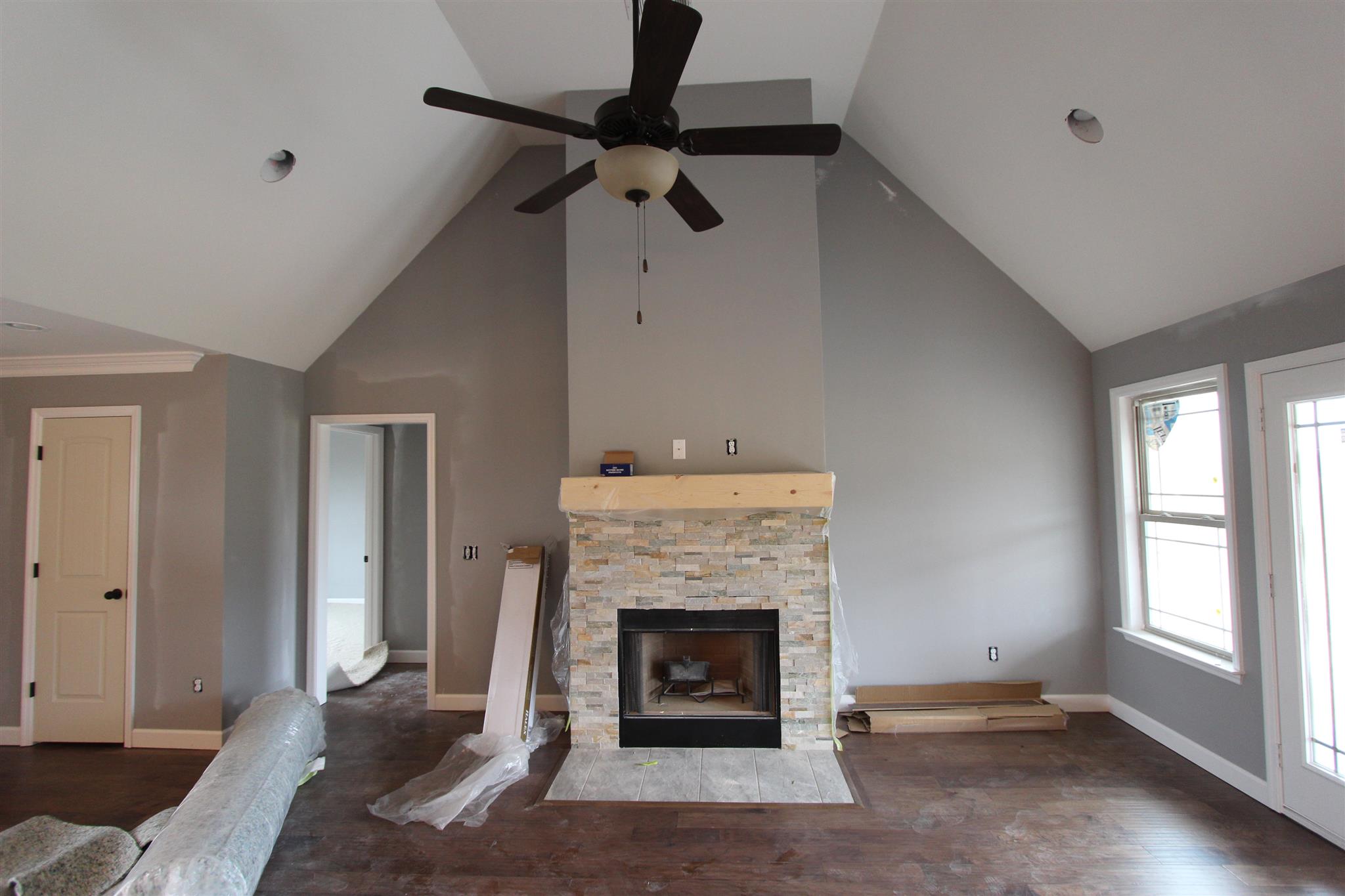 400 Beech Log Road Watertown, TN 37184 - Photo 12 of 22 a living room with a fireplace and a window