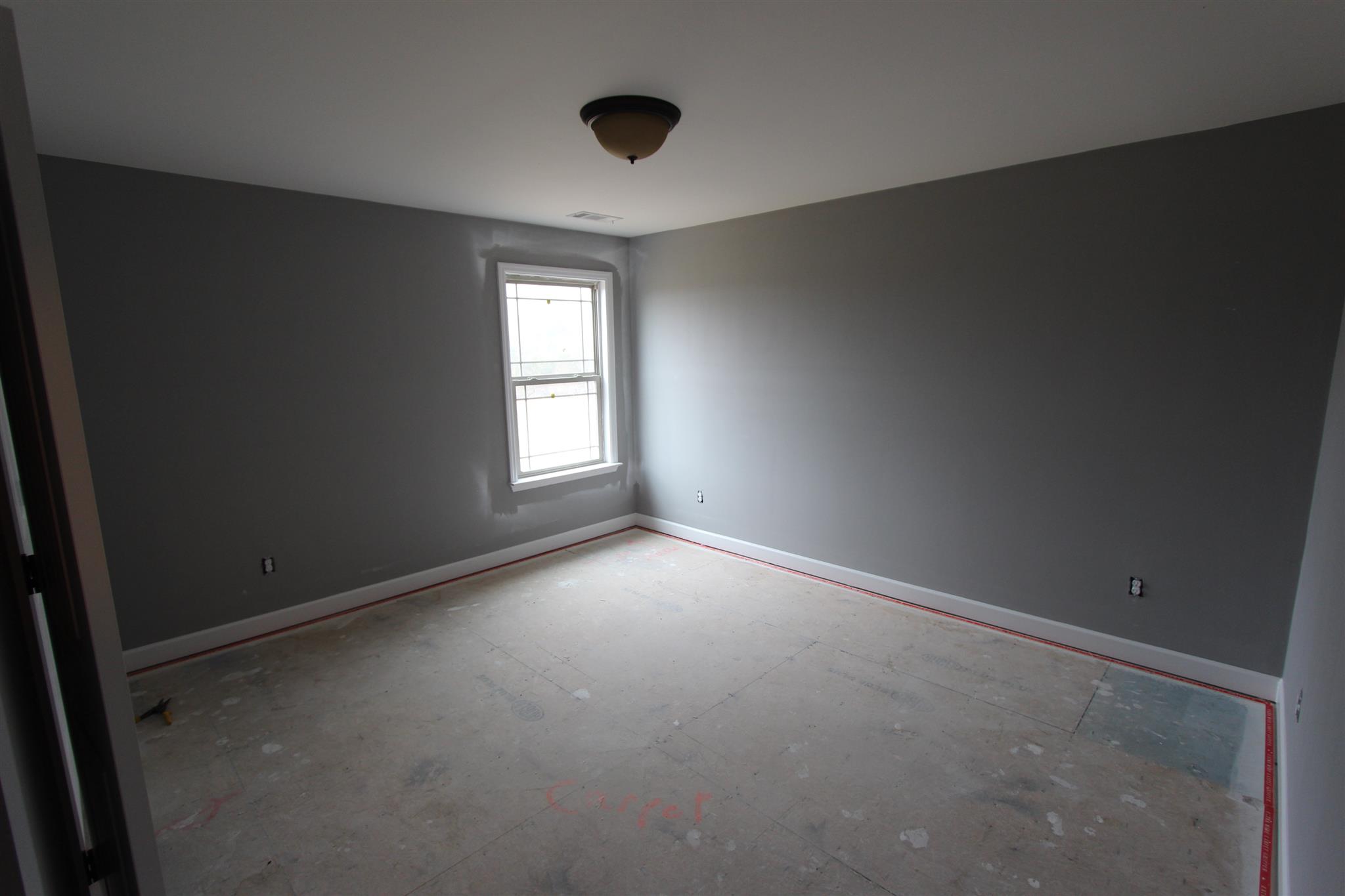 400 Beech Log Road Watertown, TN 37184 - Photo 22 of 22 an empty room with windows and closet