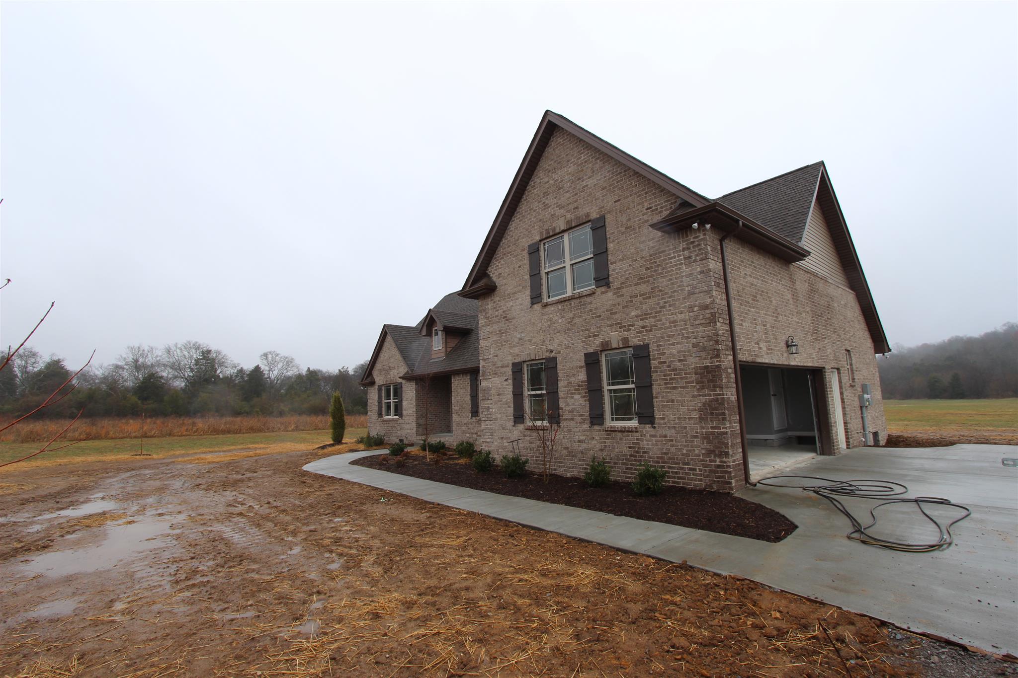 400 Beech Log Road Watertown, TN 37184 - Photo 5 of 22 a front view of a house with a yard
