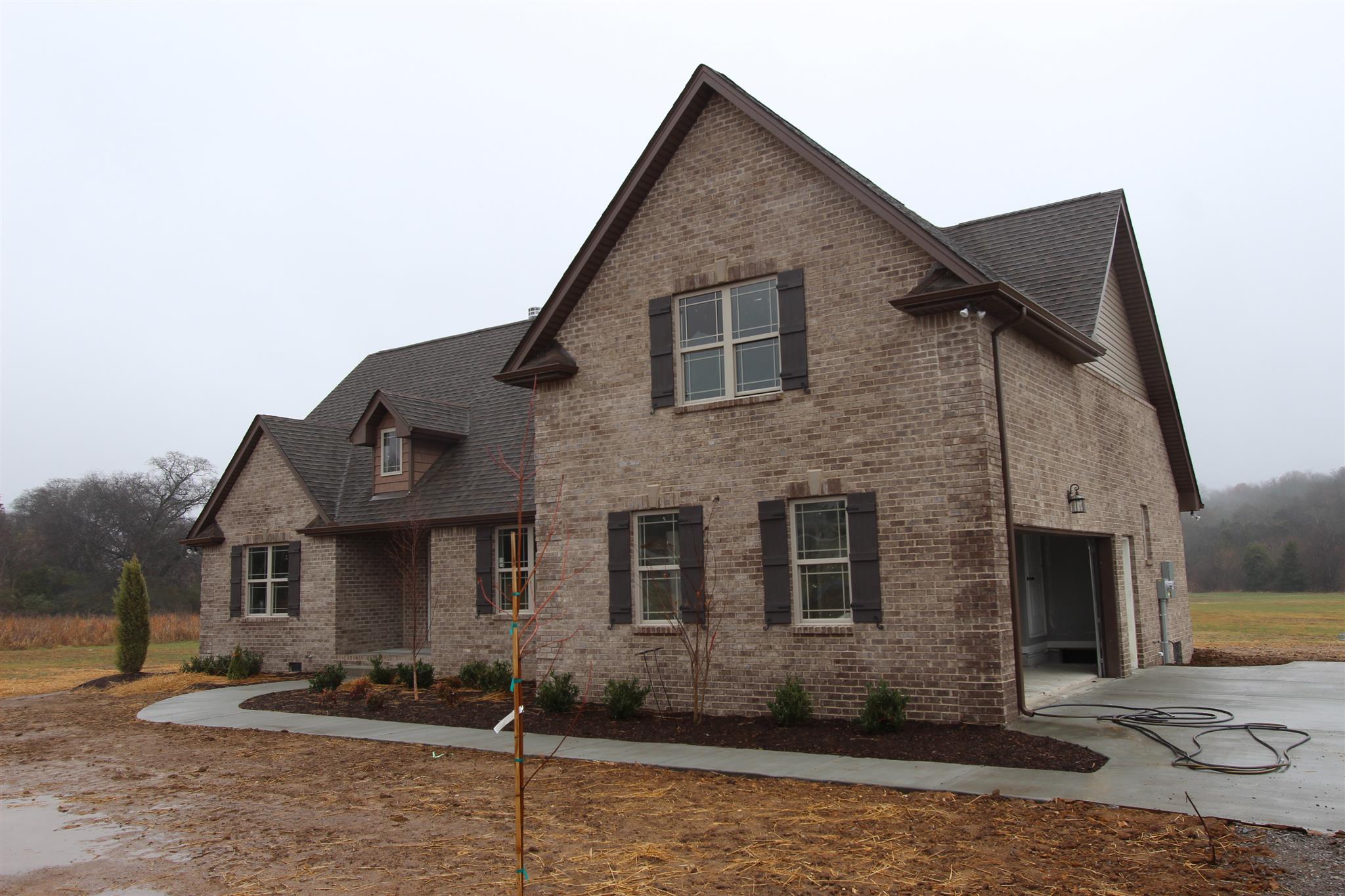 400 Beech Log Road Watertown, TN 37184 - Photo 6 of 22 a front view of a house with garage