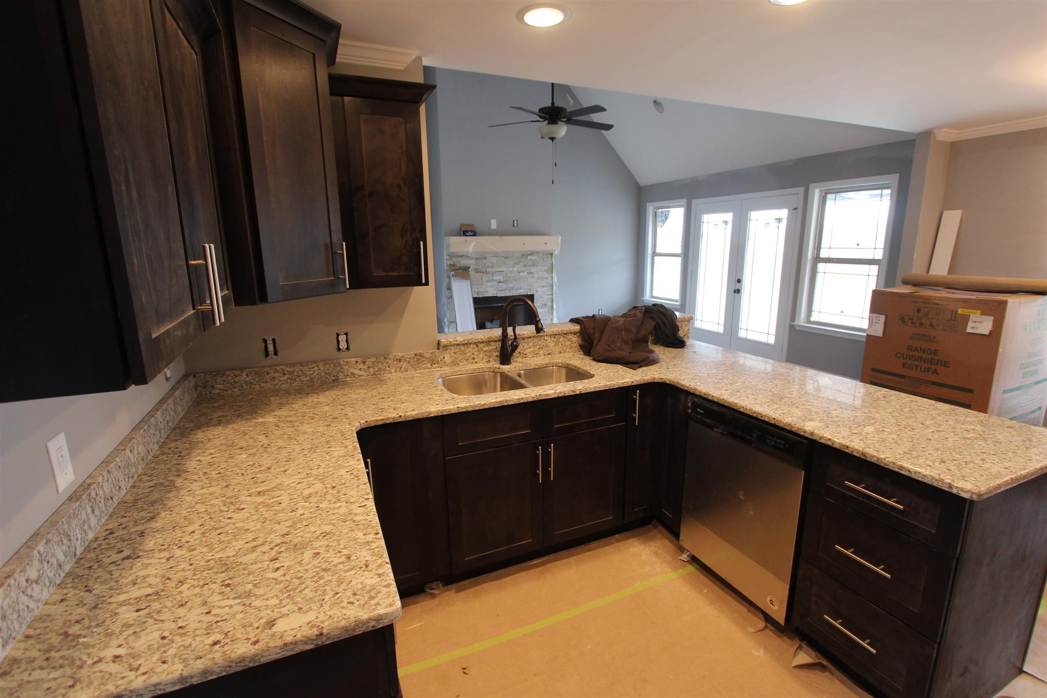 400 Beech Log Road Watertown, TN 37184 - Photo 9 of 22 a kitchen with a sink and a refrigerator