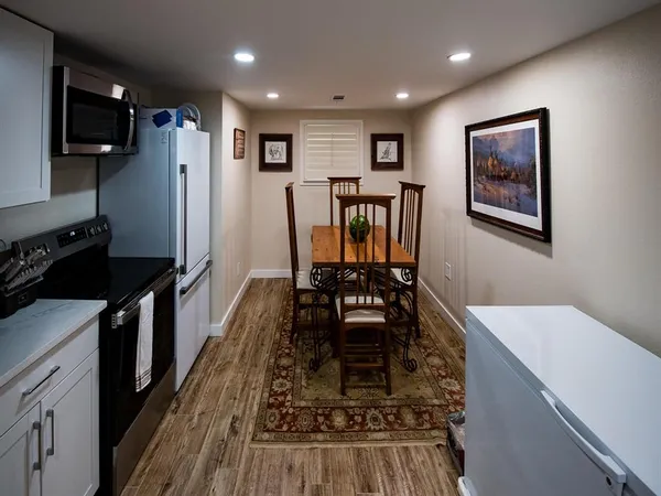 a bathroom with a toilet sink and shower