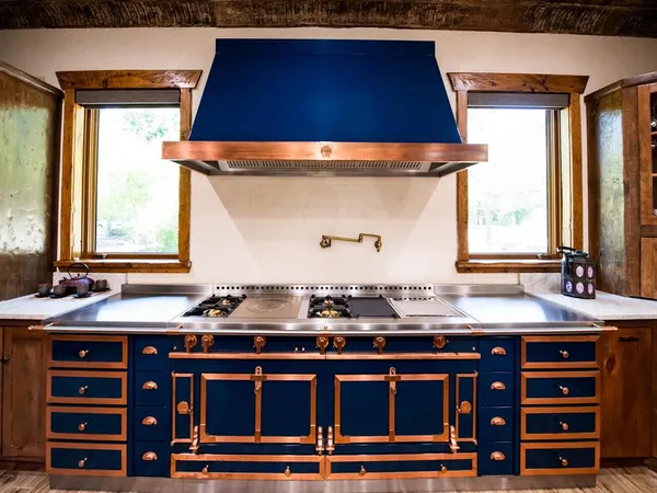 a kitchen with a sink and a stove
