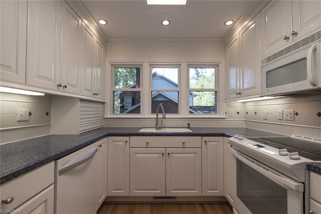 5317 Tower Road Greensboro, NC 27410 - Photo 11 of 30 Great work flow in the kitchen