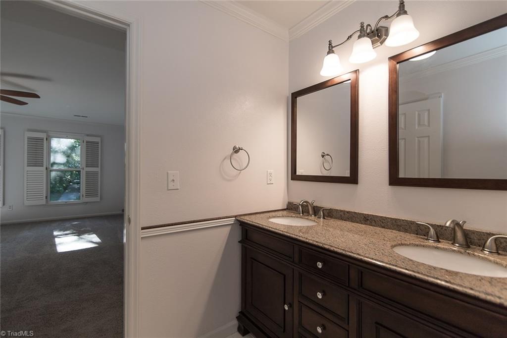 5317 Tower Road Greensboro, NC 27410 - Photo 20 of 30 Master bathroom, double vanity with mirrors