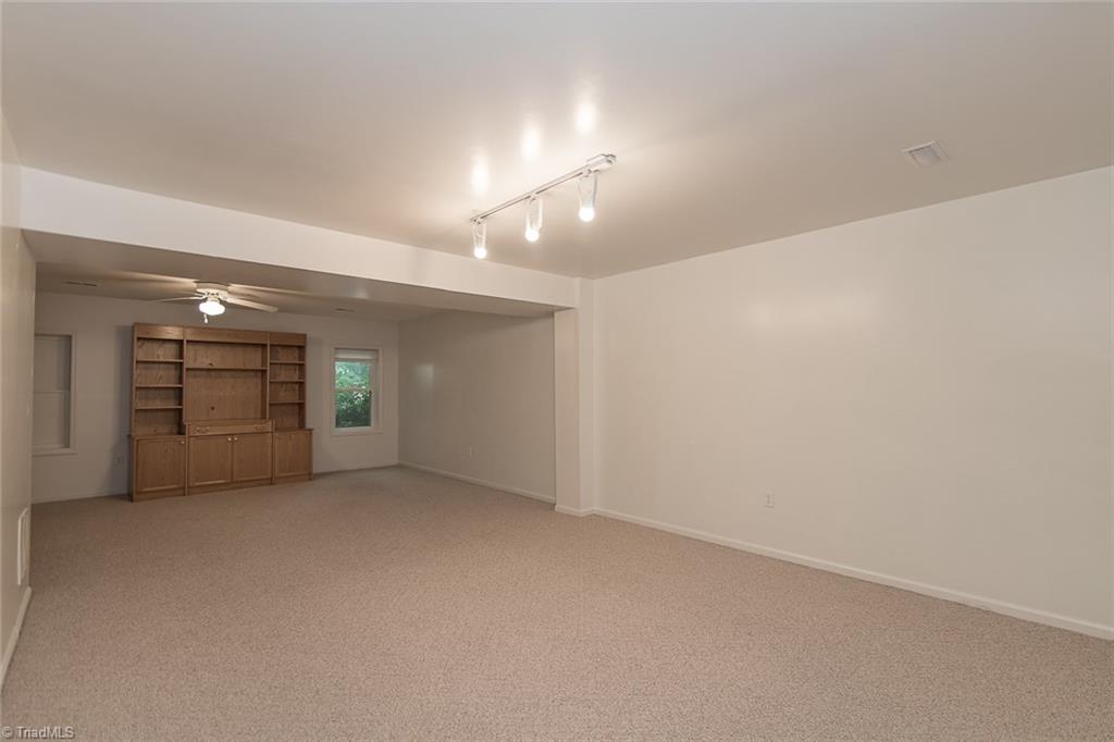 5317 Tower Road Greensboro, NC 27410 - Photo 25 of 30 Finished basement with half bath for guest