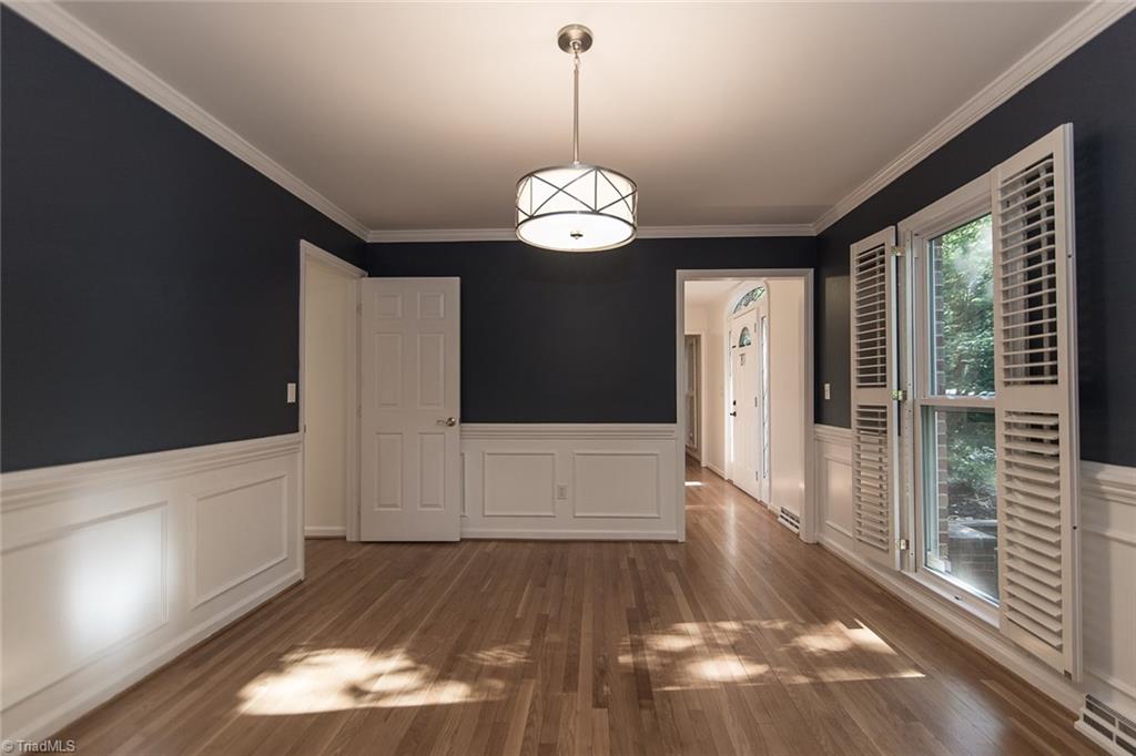 5317 Tower Road Greensboro, NC 27410 - Photo 5 of 30 Dining Room with the bid windows and Plantation shutters