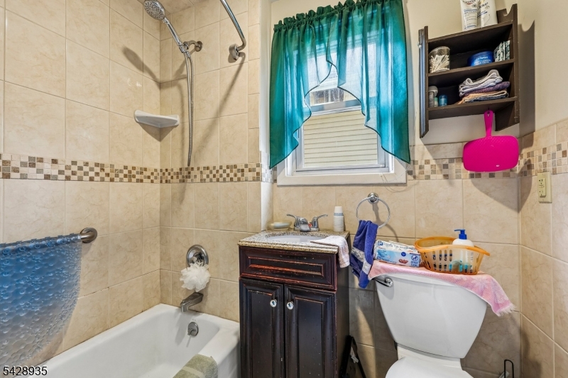 50 Preston Street Ridgefield Park, NJ 07660 - Photo 25 of 41 a bathroom with a sink toilet and shower