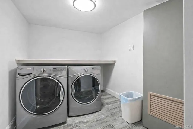 a view of kitchen with white cabinets and white appliances