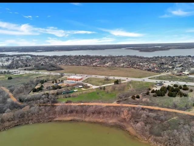 a view of a city with an ocean