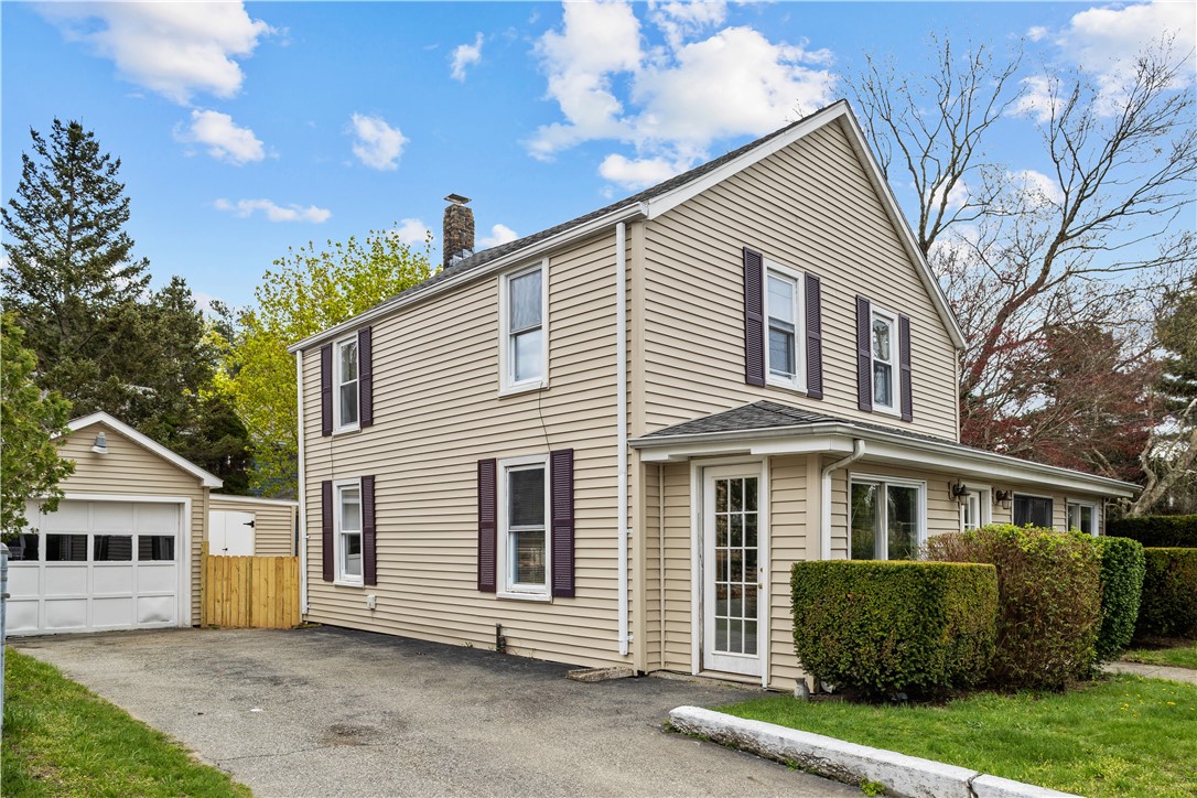 1021 Anthony Road Portsmouth, RI 02871 - Photo 2 of 32 Front side of house first
drive way w/garage
