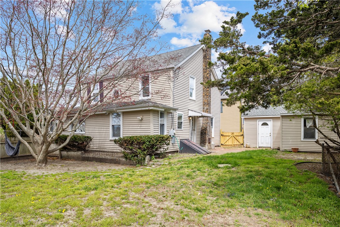1021 Anthony Road Portsmouth, RI 02871 - Photo 24 of 32 Yard plus garage side door entry into fenced yard.