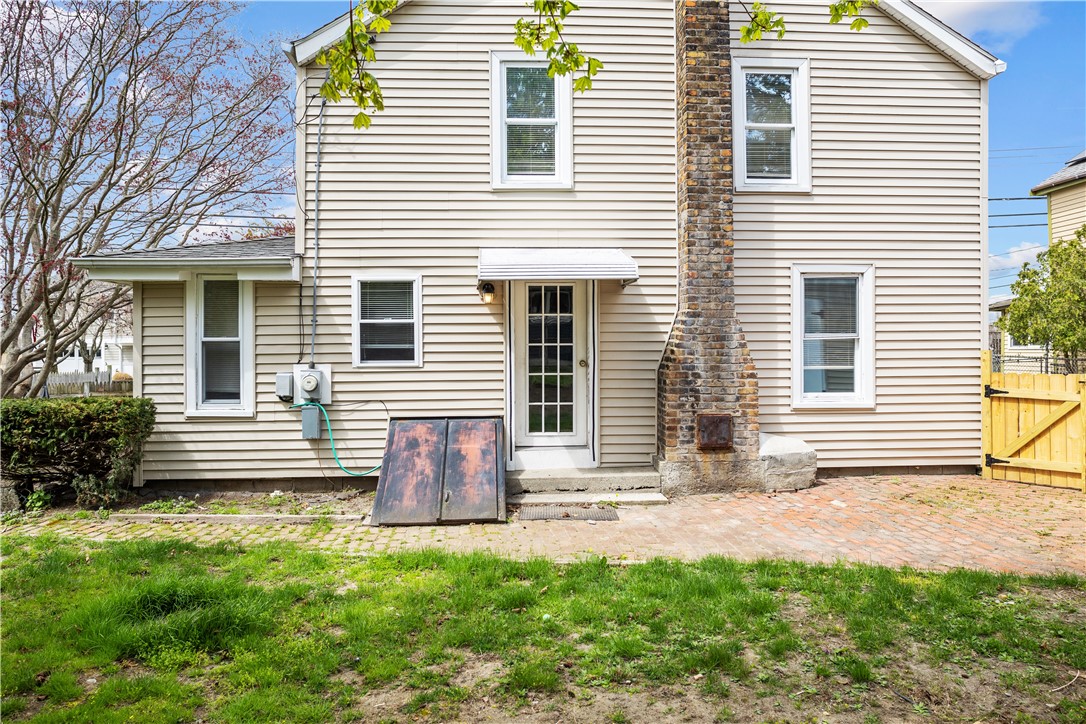 1021 Anthony Road Portsmouth, RI 02871 - Photo 3 of 32 Brick patio off kitchen