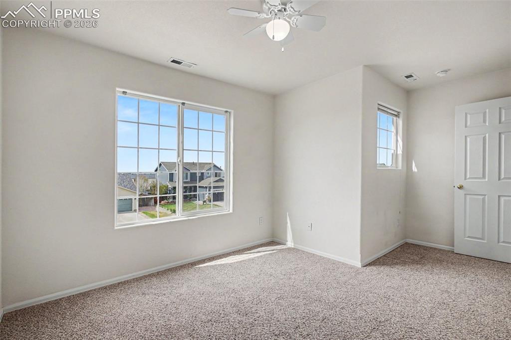 12210 Crystal Downs Road Peyton, CO 80831 - Photo 21 of 40 a view of an empty room with a window
