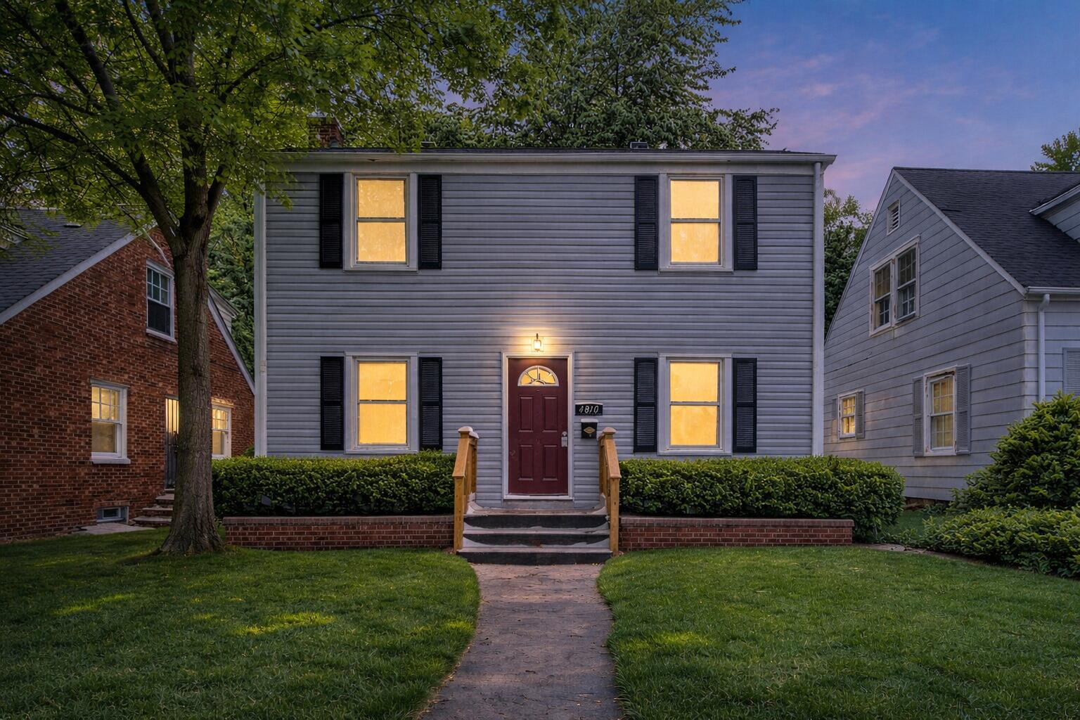 4810 Monroe Street Gary, IN 46408 - Photo 1 of 19 a front view of a house with a yard