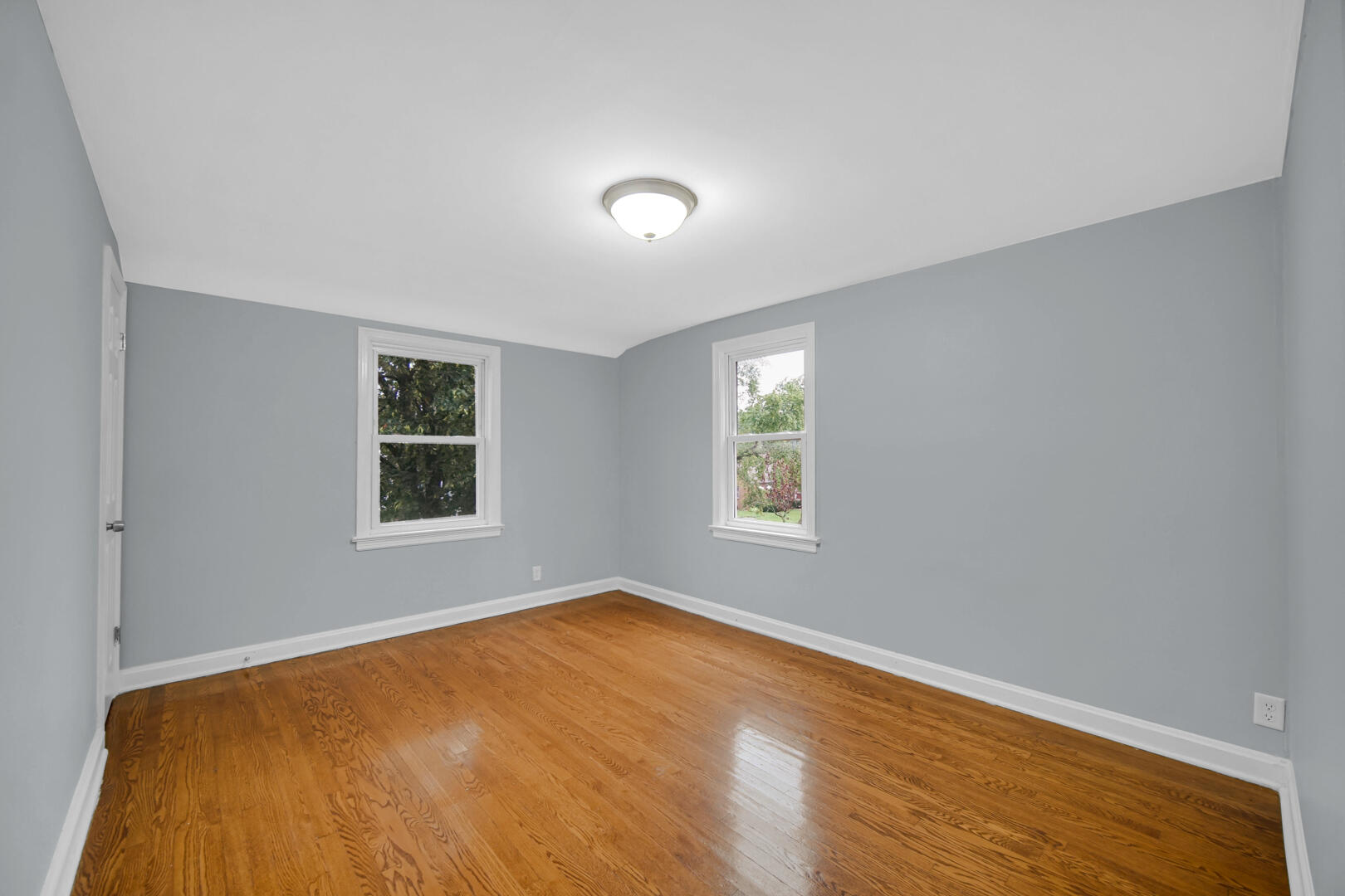 4810 Monroe Street Gary, IN 46408 - Photo 14 of 19 a view of an empty room with a window