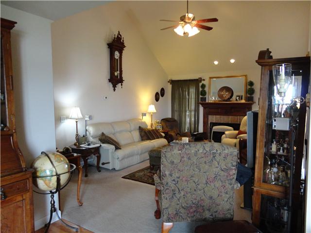 6153 Lakeview Road Springfield, TN 37172 - Photo 2 of 16 Living rm from foyer. Note the vaulted ceiling with fan and fireplace.