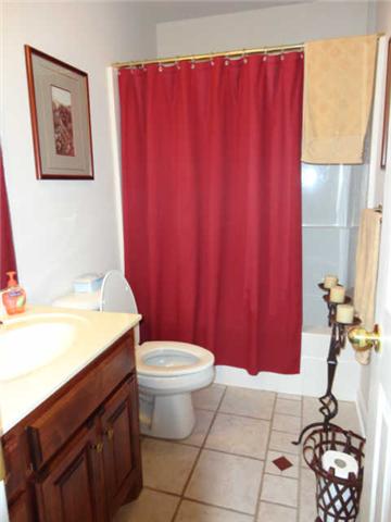 6153 Lakeview Road Springfield, TN 37172 - Photo 14 of 16 Guest bath with ceramic tile floor and custom built vanity.